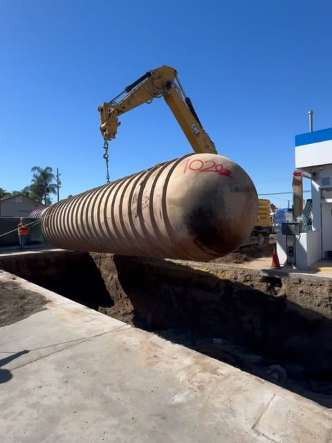Fuel tank being lifted into position